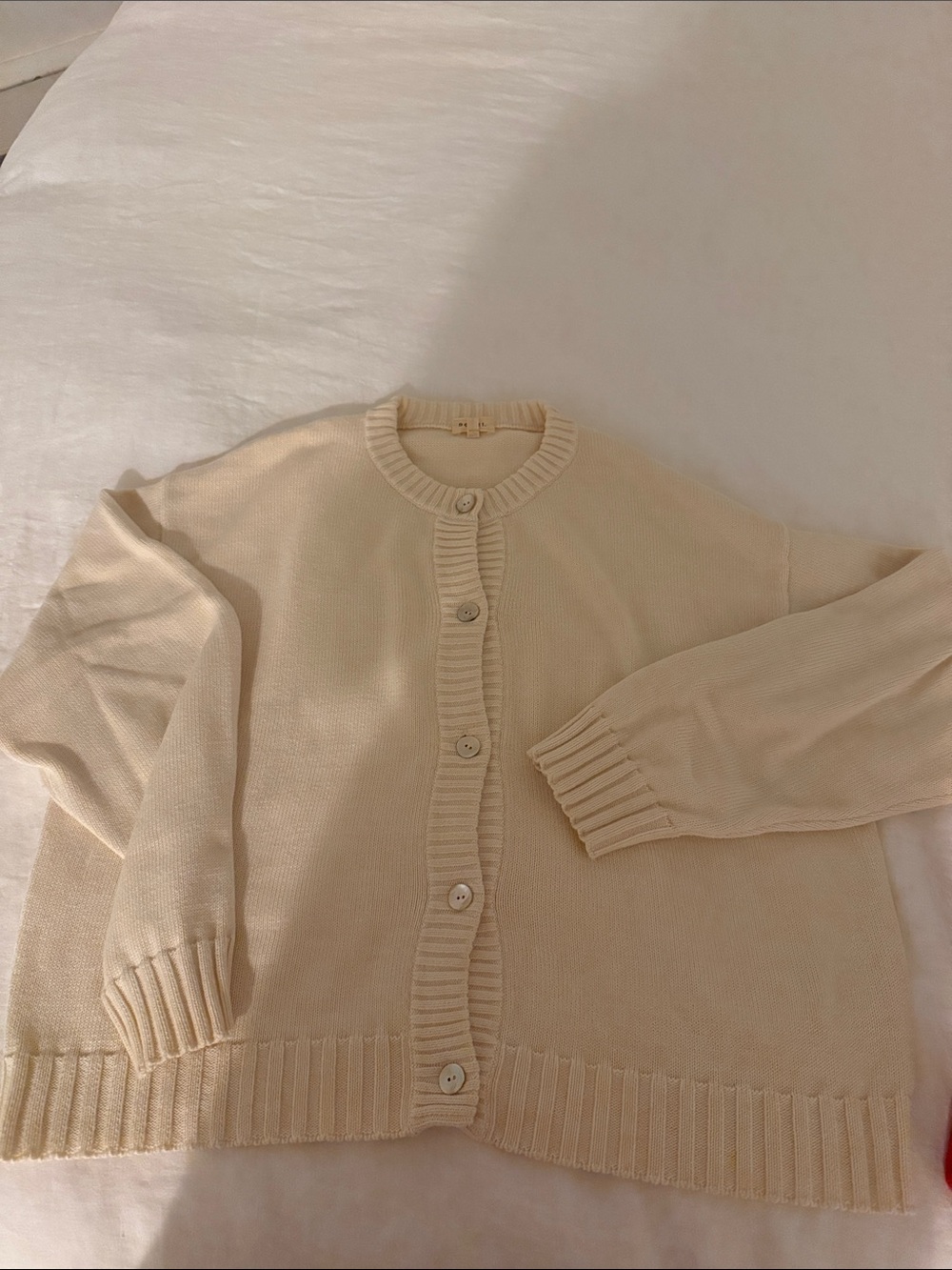 DONNI The Cotton Knit Cardigan in Crème - Picture 5 of 5